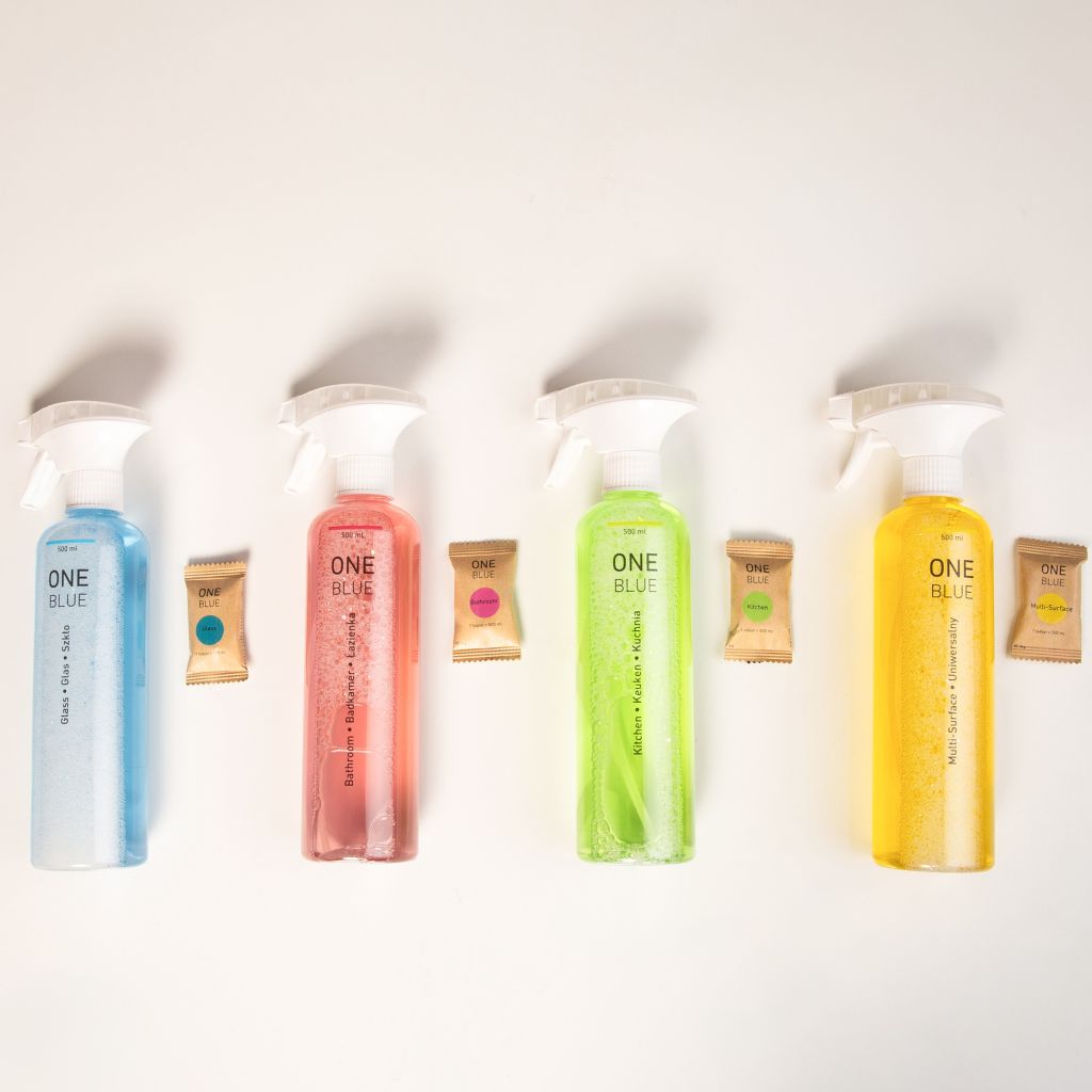 One Blue cleaning products with 4 bottles and 4 tablets